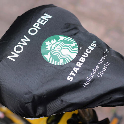 Custom polyester bike seat covers — printed for guerrilla marketing and brand events Custom polyester bike seat covers — printed for marketing and brand events